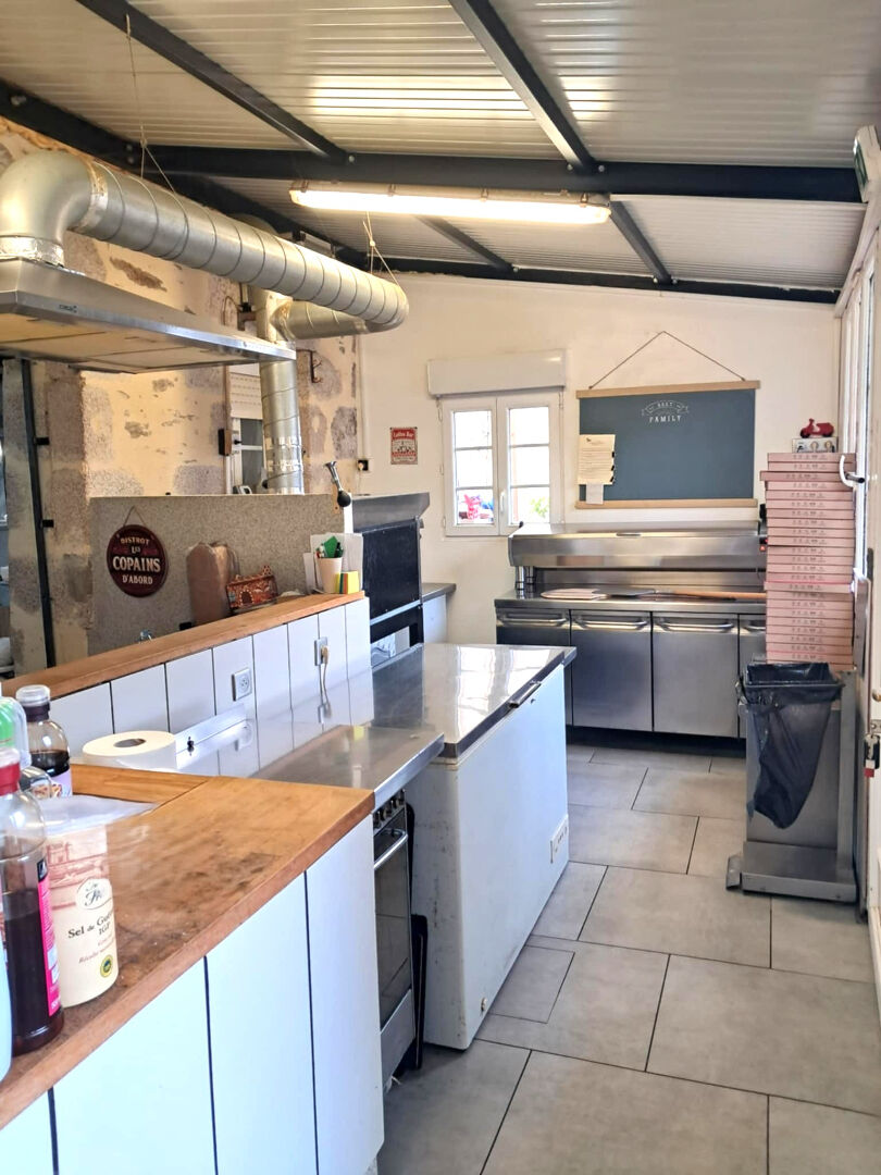 Modern kitchen in a property located in Haute-Vienne, Nouvelle-Aquitaine, featuring stainless steel appliances and ample