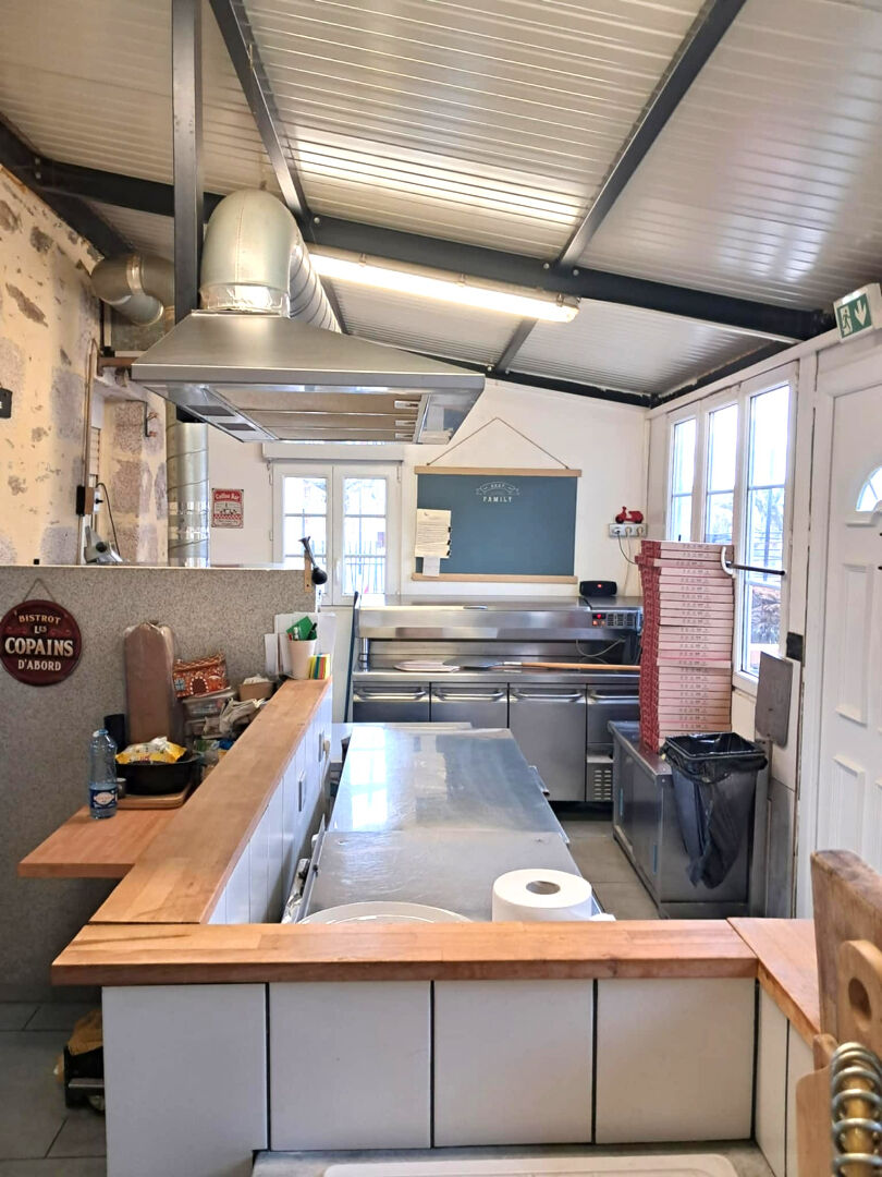 Spacious property kitchen in Haute-Vienne, Nouvelle-Aquitaine, featuring modern appliances and ample workspace.