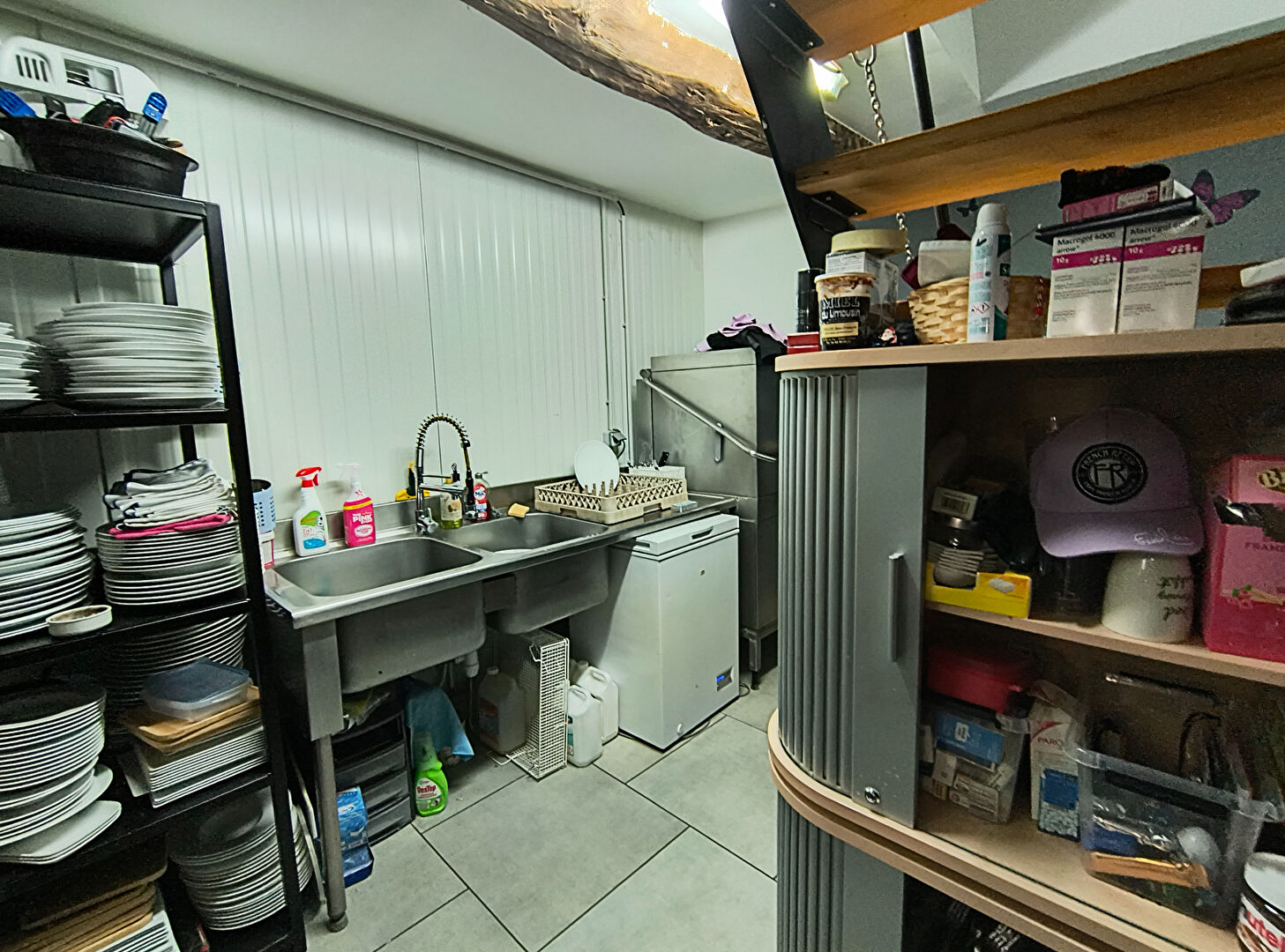 Kitchen space in a 7-bedroom property located in Haute-Vienne, Nouvelle-Aquitaine, featuring appliances and storage.