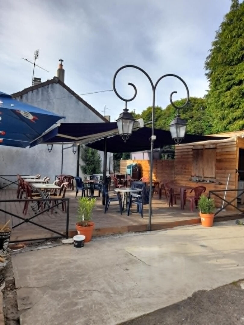 Property in Haute-Vienne, Nouvelle-Aquitaine, featuring an outdoor terrace with seating and stylish lanterns.