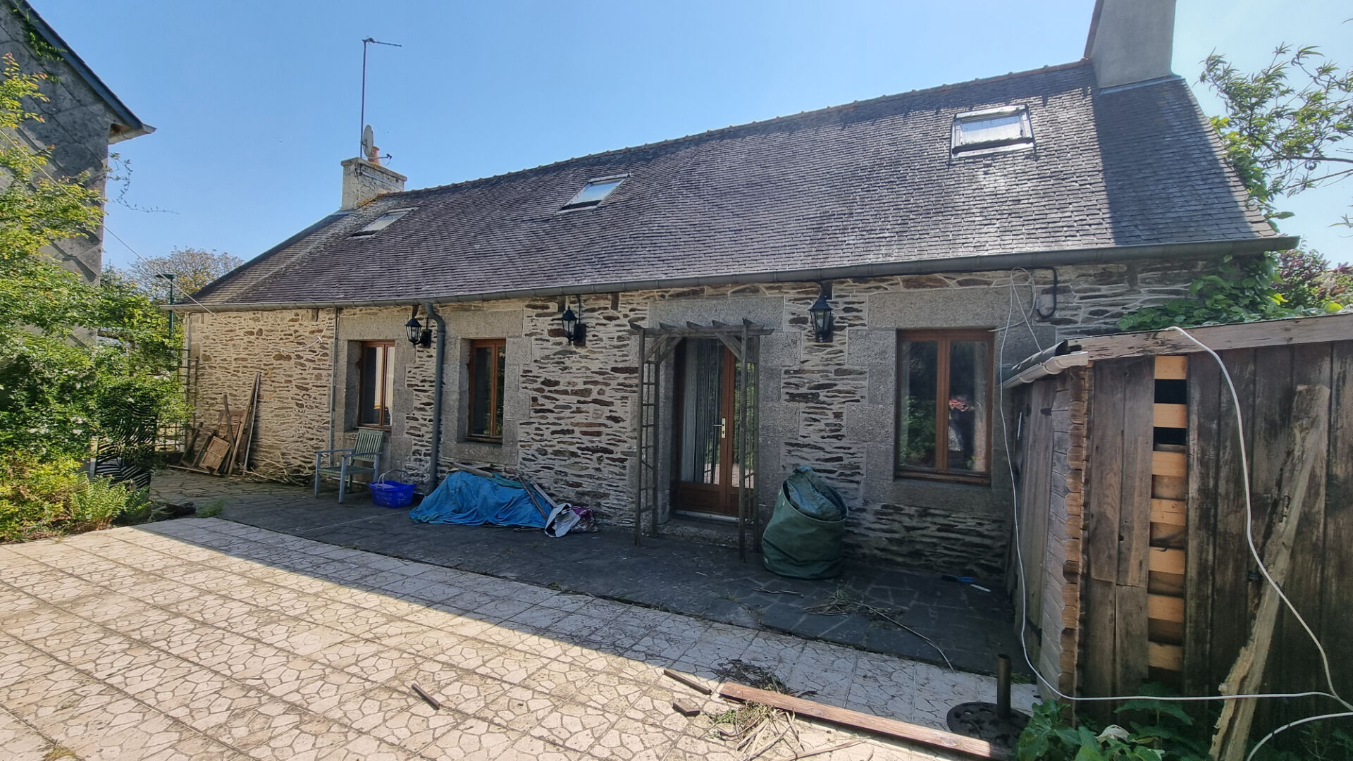 Three-bedroom property in Côtes-d'Armor, Brittany, featuring a stone facade and outdoor space.