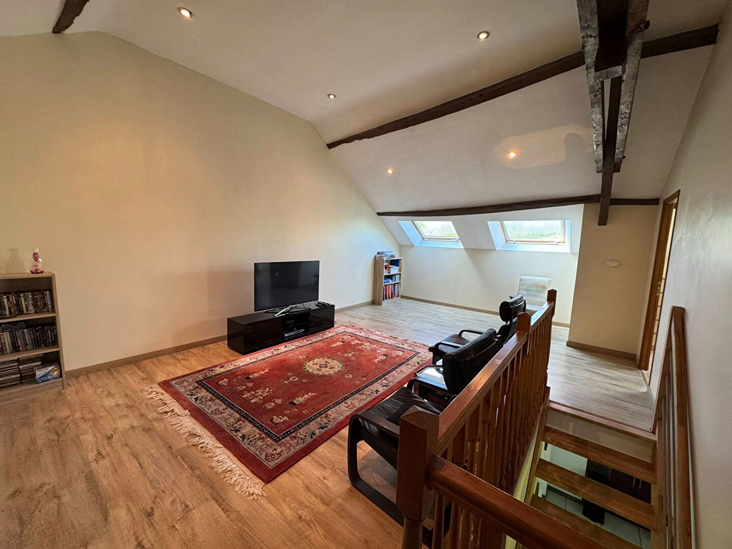 Spacious property in Haute-Vienne with wooden beams, skylights, and a comfortable living area.
