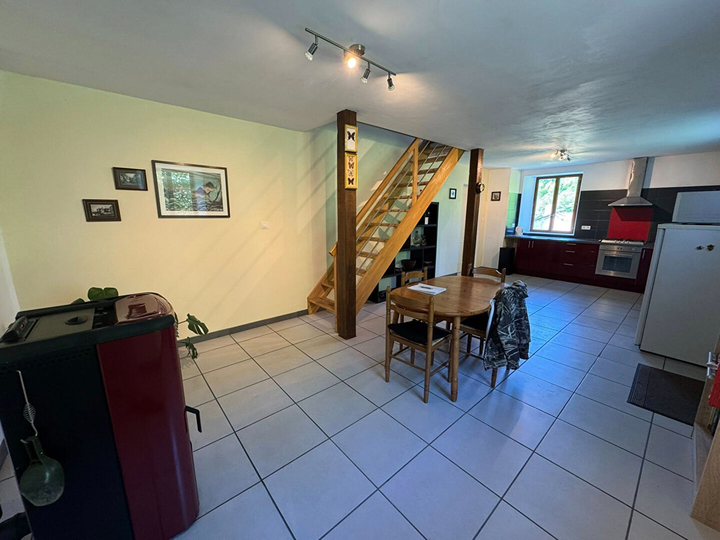 Two-bedroom property in Haute-Vienne, Nouvelle-Aquitaine, featuring open-plan living area and kitchen with modern finishes.