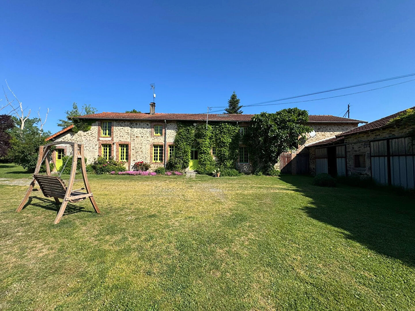 Renovated property in Haute-Vienne, Nouvelle-Aquitaine, featuring a spacious garden and rustic stone architecture.