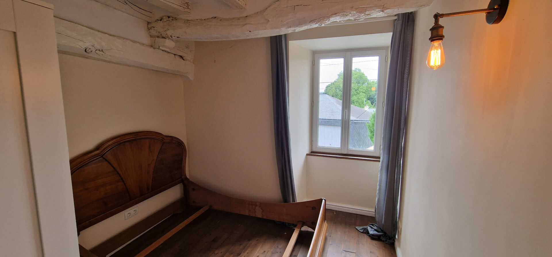 Three-bedroom property in Morbihan, Brittany, featuring natural light and rustic wooden beams.