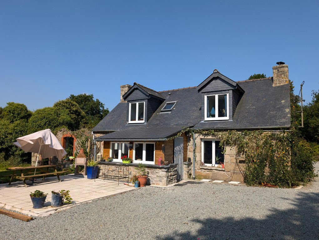 Charming property in Côtes-d'Armor, Brittany, featuring a garden, terrace, and three bedrooms in a tranquil setting.