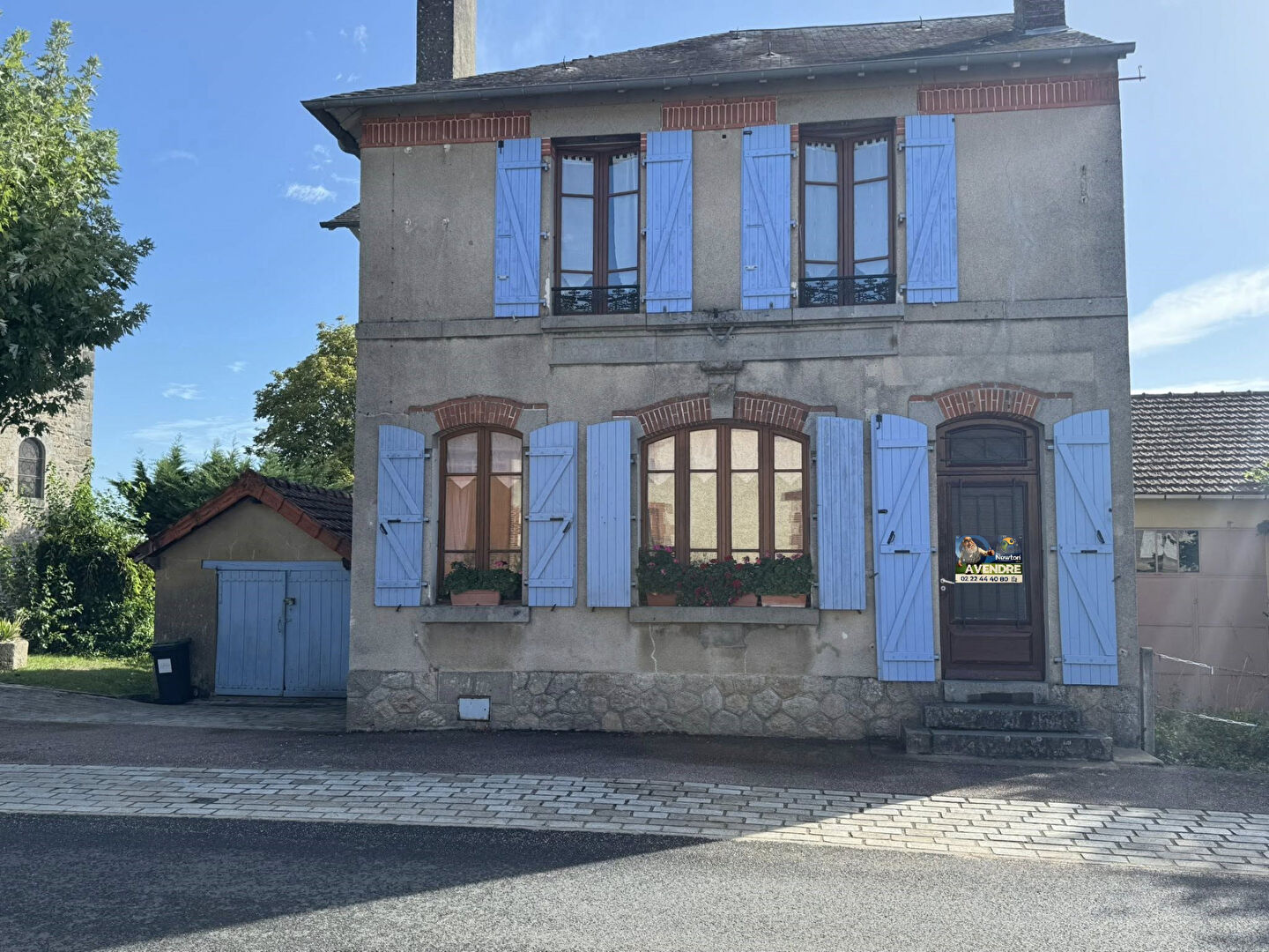 Three-bedroom property in Haute-Vienne, Nouvelle-Aquitaine, featuring blue shutters and charming architectural details.