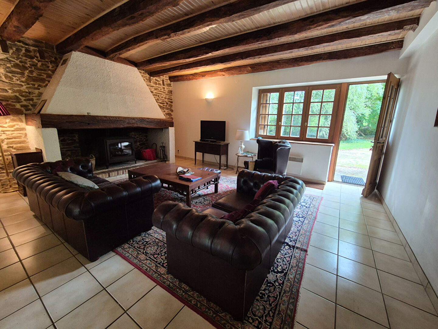 Photo CORREZE. LUBERSAC. Maison en pierre de 3 chambres (en plein pied), grange attenante, puits et jardin plat de 3565 m². image 5/6