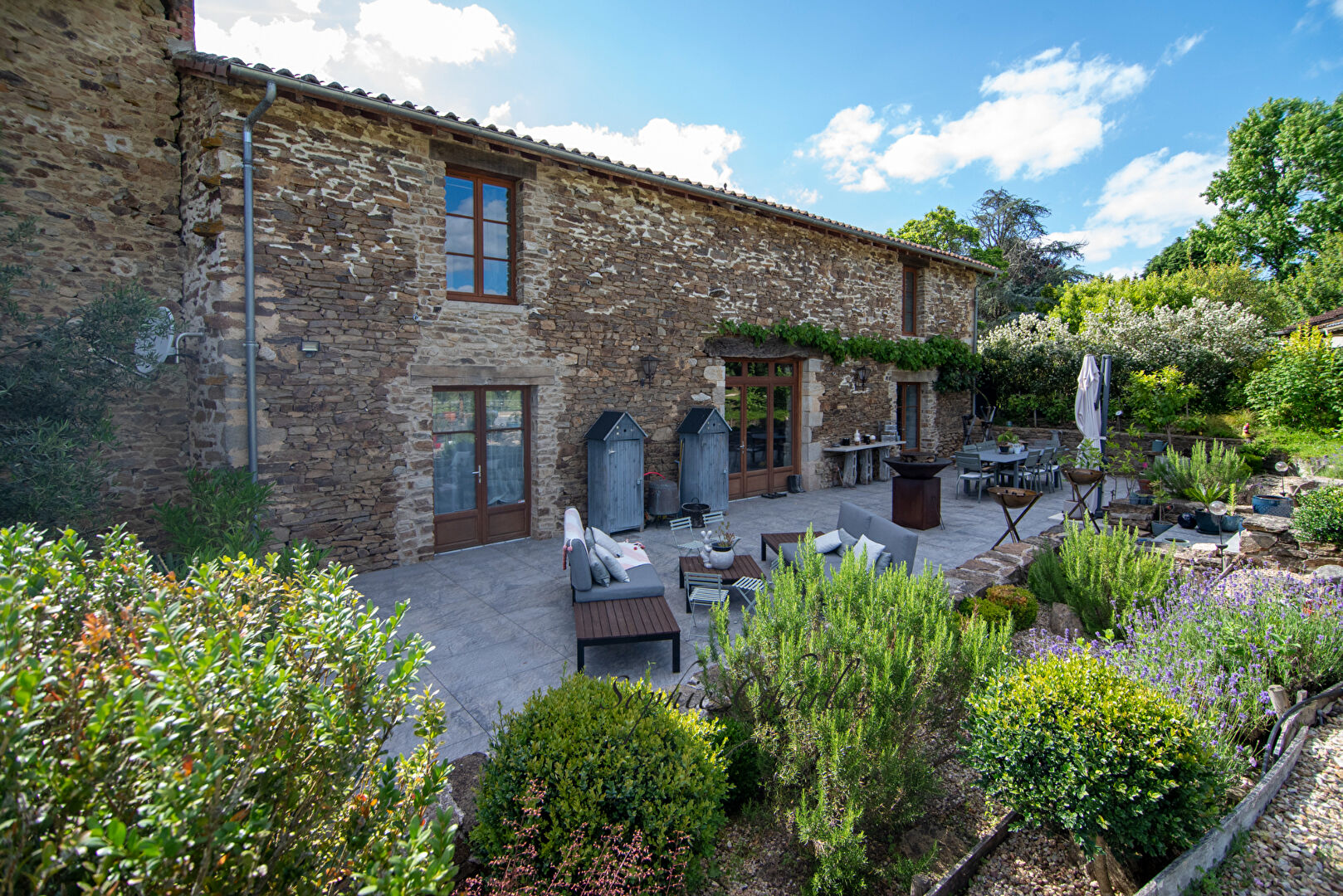 Spacious property with a garden and terrace in Haute-Vienne, Nouvelle-Aquitaine, featuring stone architecture and outdoor