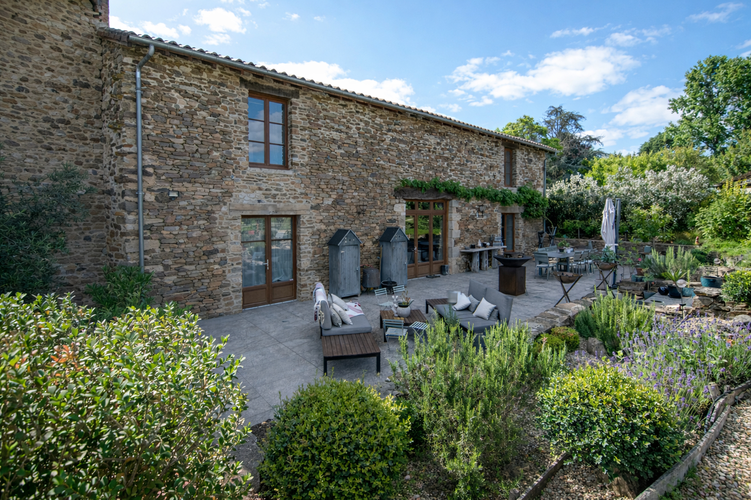 Spacious property in Haute-Vienne with stone exterior, garden, and terrace for outdoor living.