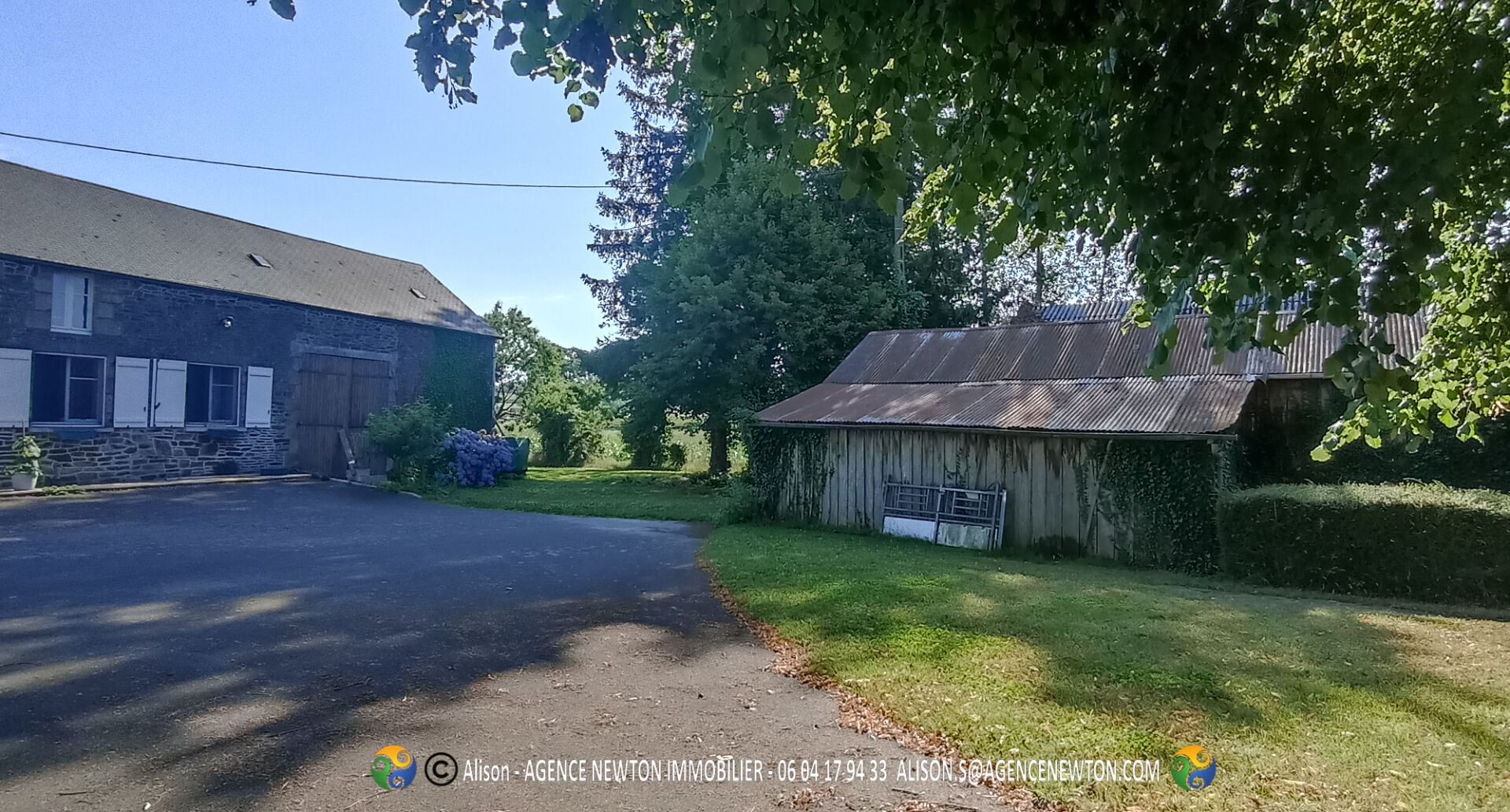 Two-bedroom property in Ille-et-Vilaine, Brittany, featuring a spacious outdoor area and nearby outbuildings.
