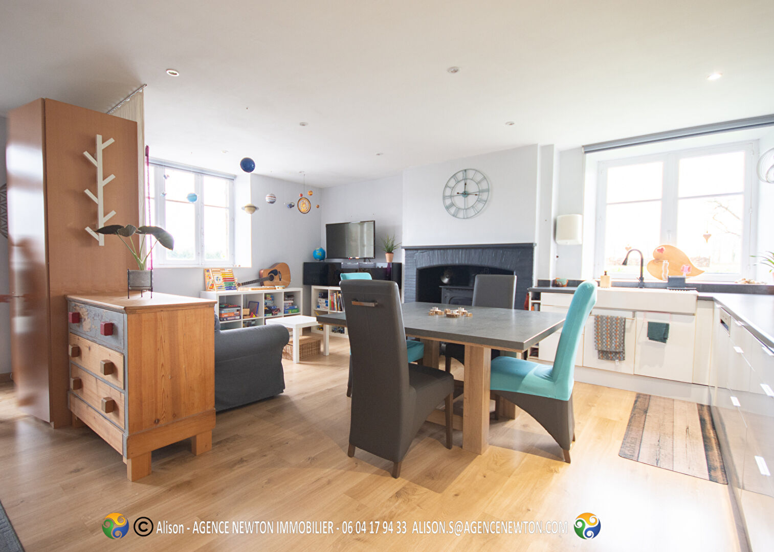 Modern apartment in Ille-et-Vilaine, Brittany, featuring a spacious living area and stylish kitchen.