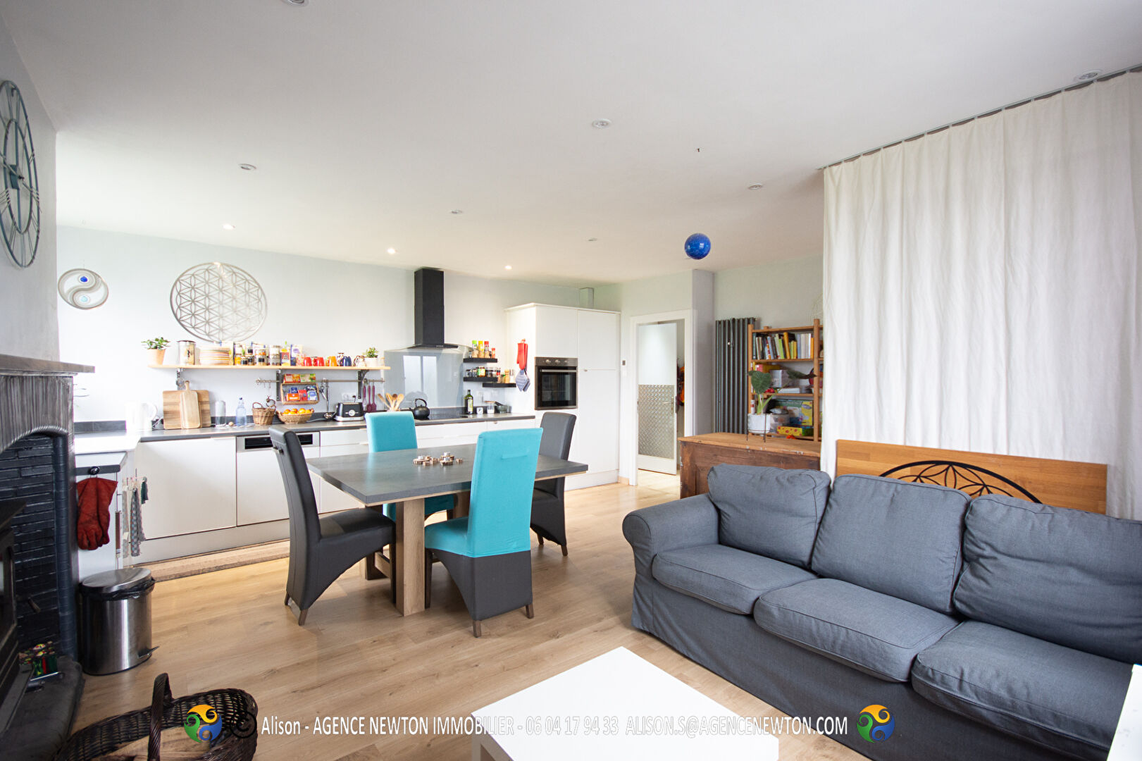 Bright kitchen and living area in property located in Ille-et-Vilaine, Brittany, featuring modern furnishings and ample space