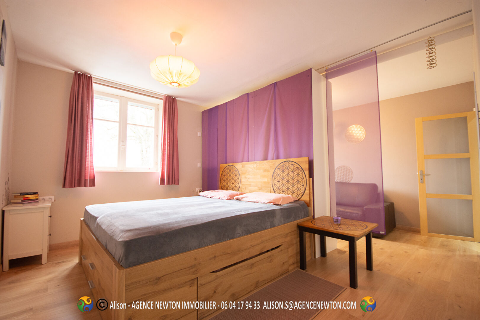 Bright bedroom featuring wooden furnishings in a property located in Ille-et-Vilaine, Brittany, postcode 35300.