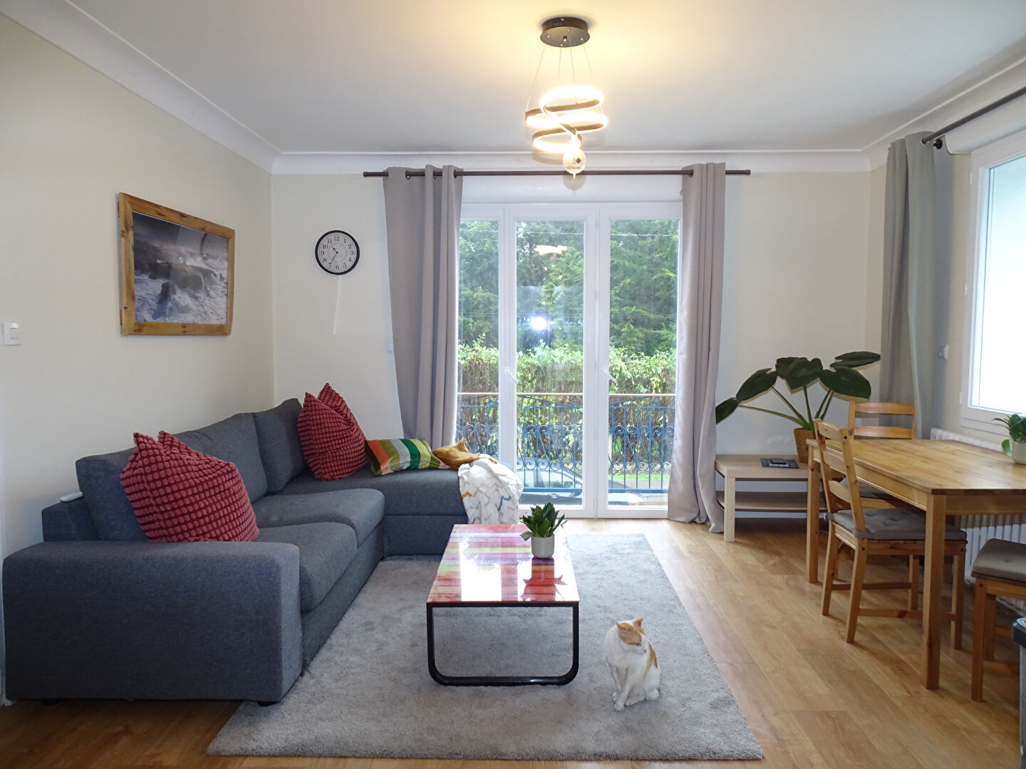 Spacious property in Morbihan, Brittany, featuring a bright living area, modern furnishings, and access to outdoor space.