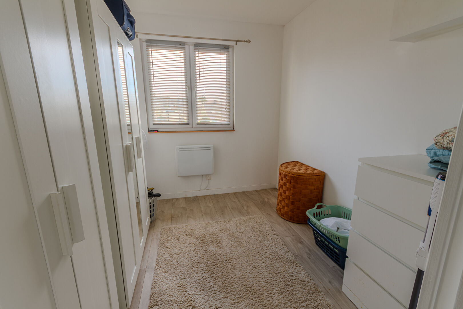 Bright interior of a property in Manche, Normandy, featuring three bedrooms and ample storage space.