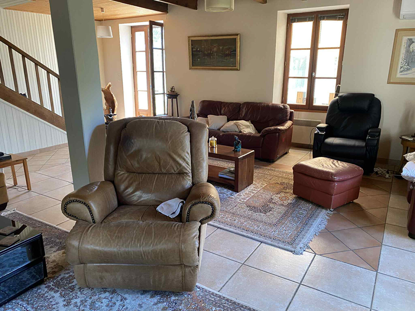 Spacious living area featuring comfortable seating in a property located in Charente, Nouvelle-Aquitaine.