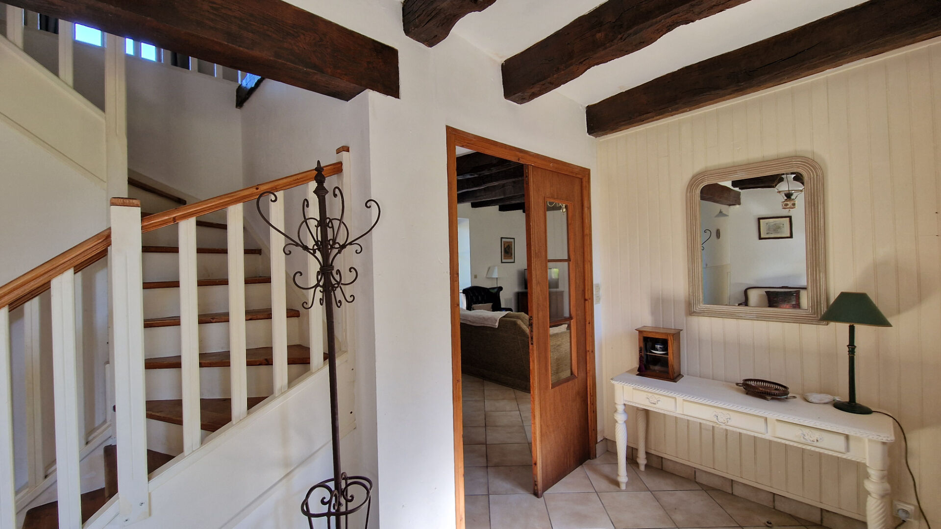 Spacious bathroom featuring a bathtub, sink, and natural light in a property located in Morbihan, Brittany, 56430.
