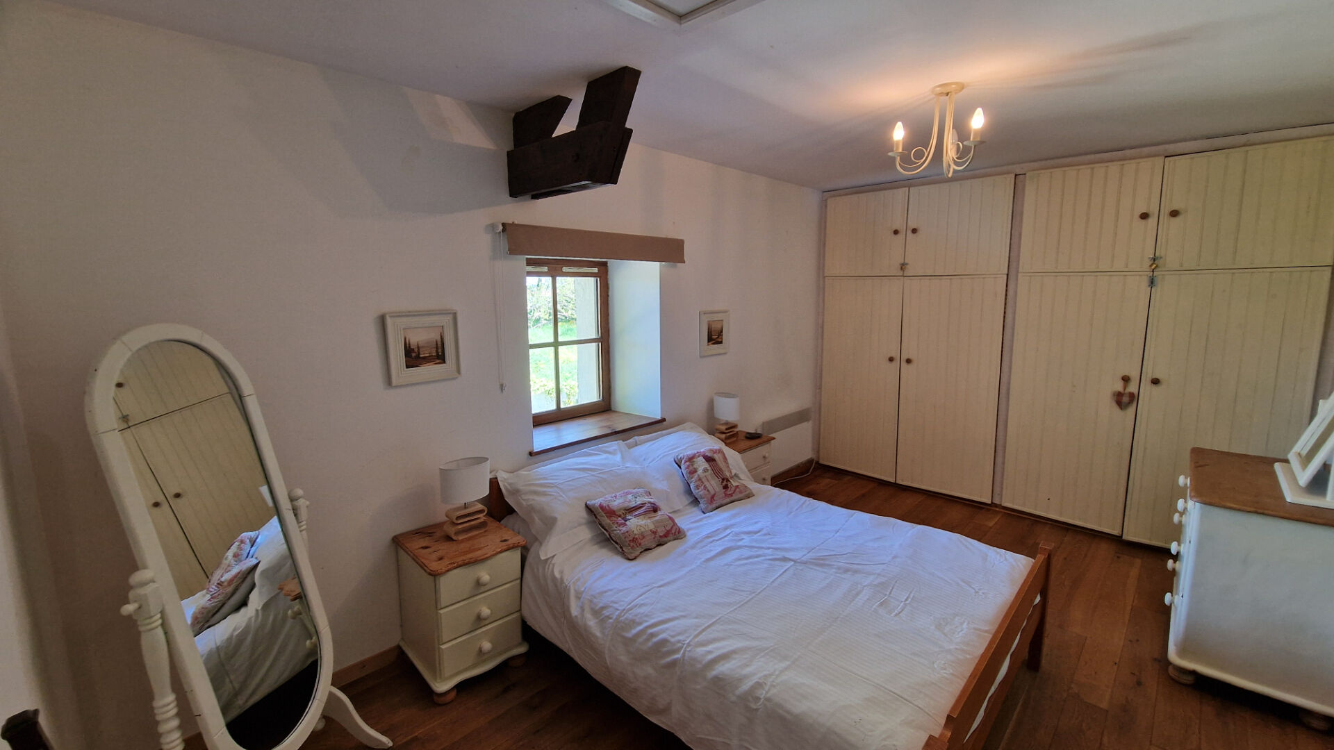 Spacious property in Morbihan, Brittany, featuring wooden flooring and natural light in a welcoming interior.