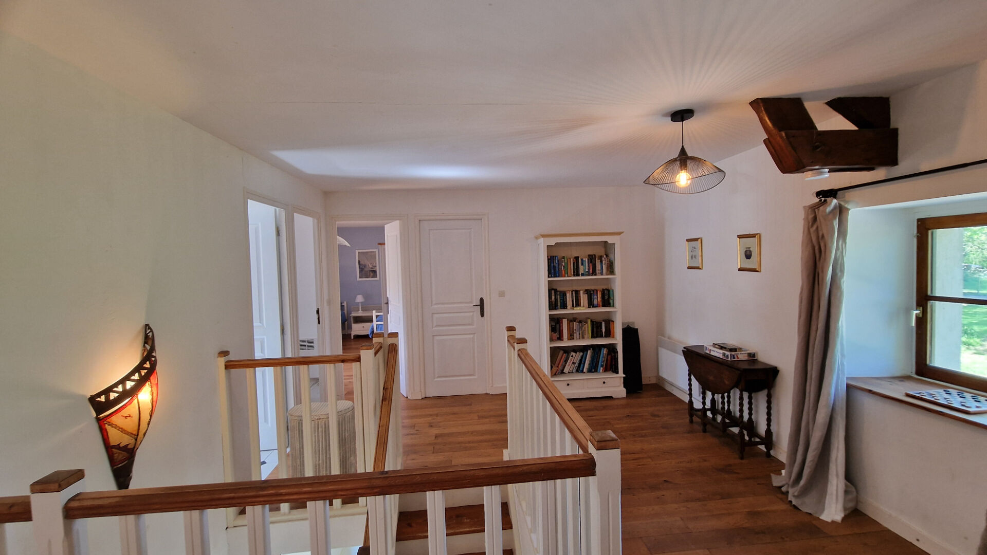 Four-bedroom property in Morbihan, Brittany, featuring wooden floors and natural light throughout.