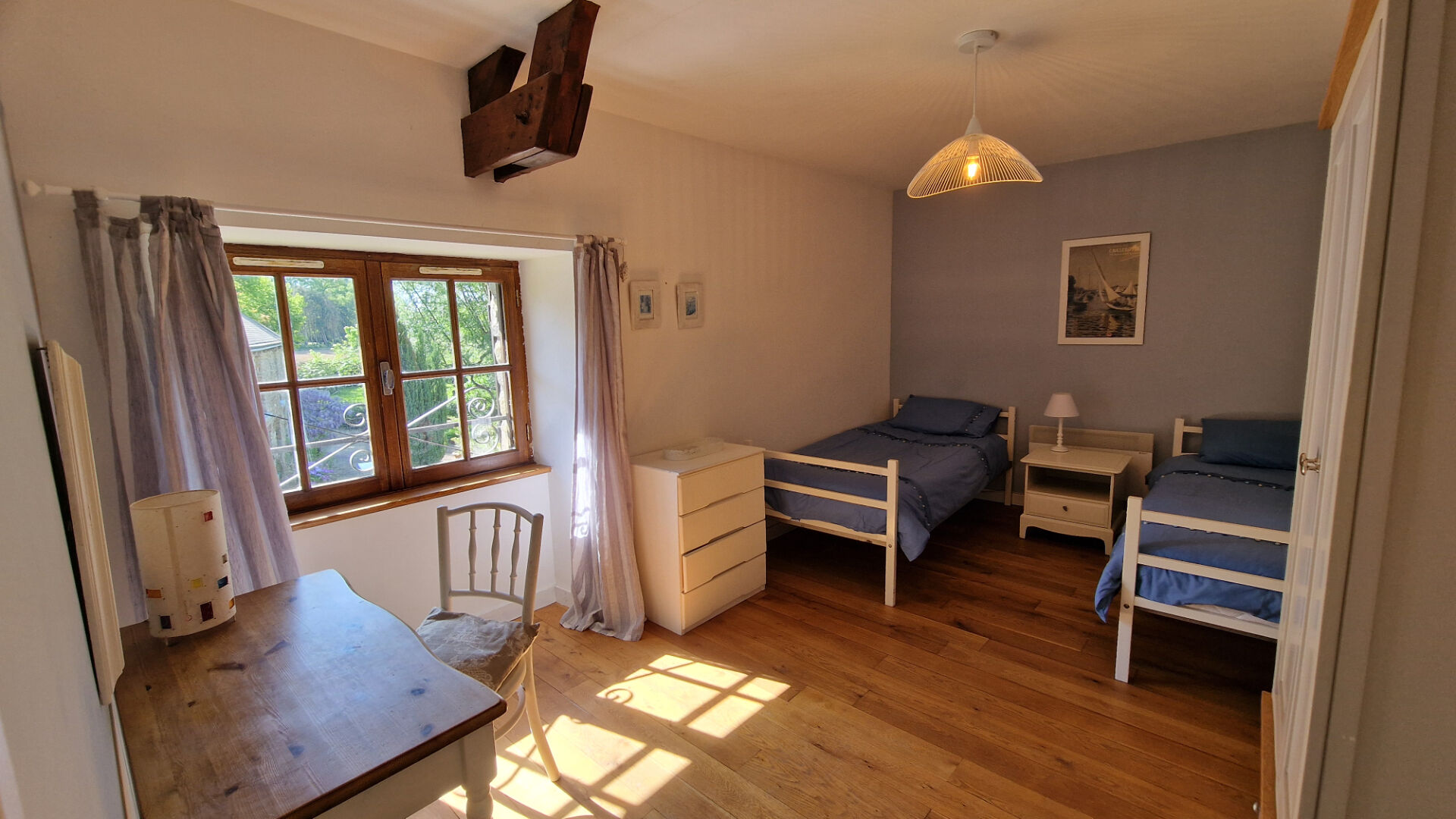 Spacious bathroom featuring a freestanding bath and elegant decor in Morbihan, Brittany. 4-bedroom property.