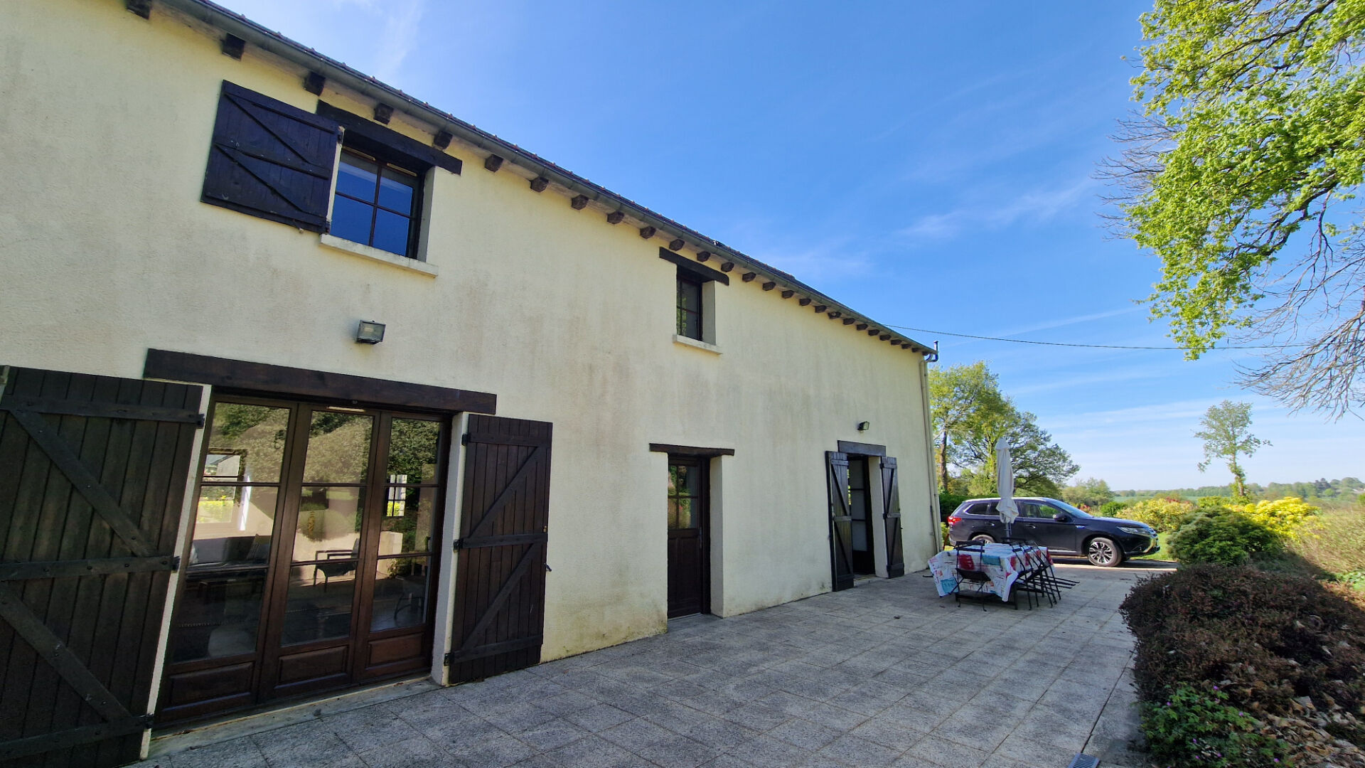 Four-bedroom property in Morbihan, Brittany, featuring a spacious terrace and natural surroundings.