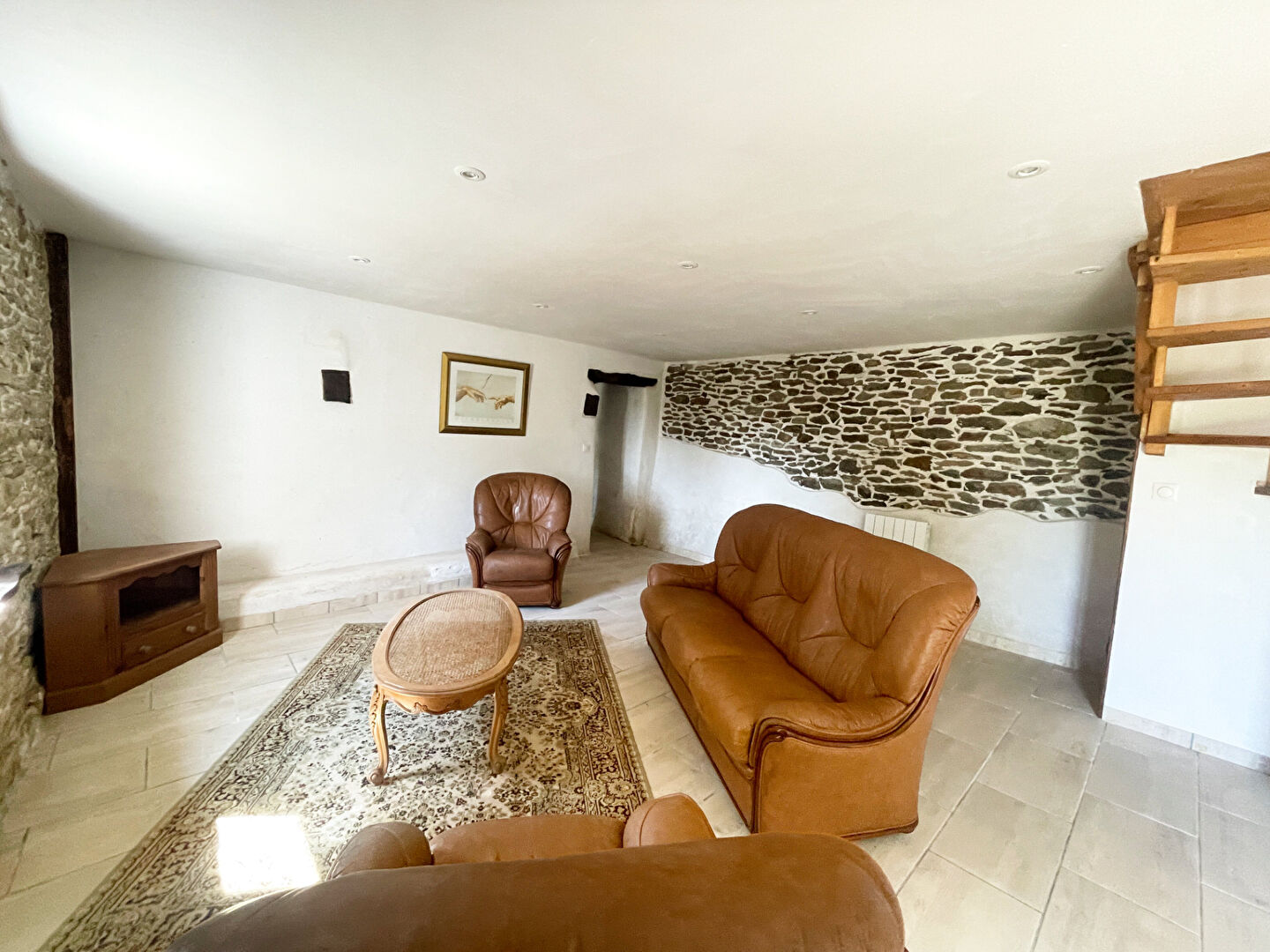 Spacious property in Finistère featuring exposed stone walls and wooden beams, with a six-bedroom layout.