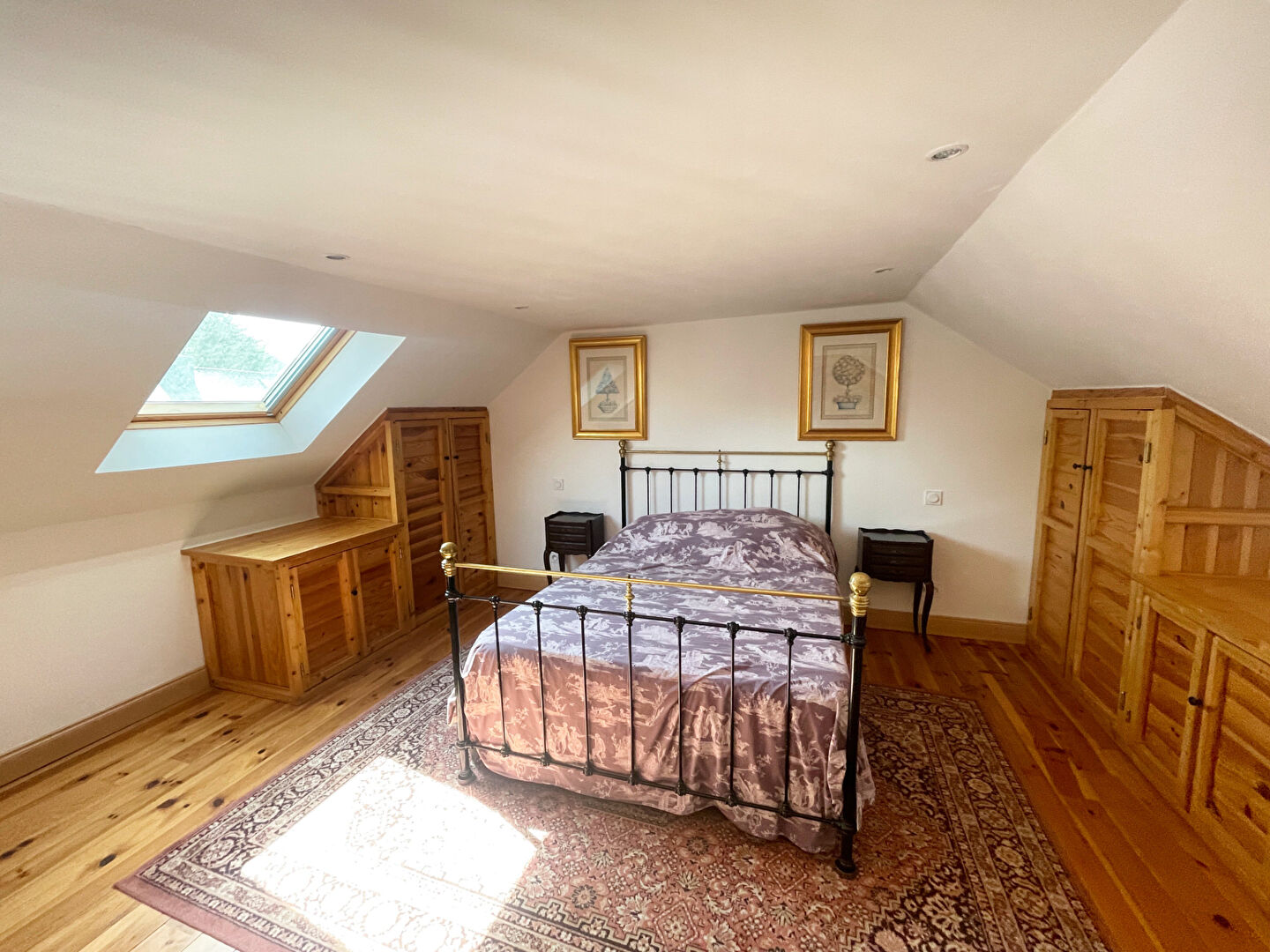 Stables with wooden beams and gravel courtyard, located in Finistère, Brittany, suitable for property with horse facilities.