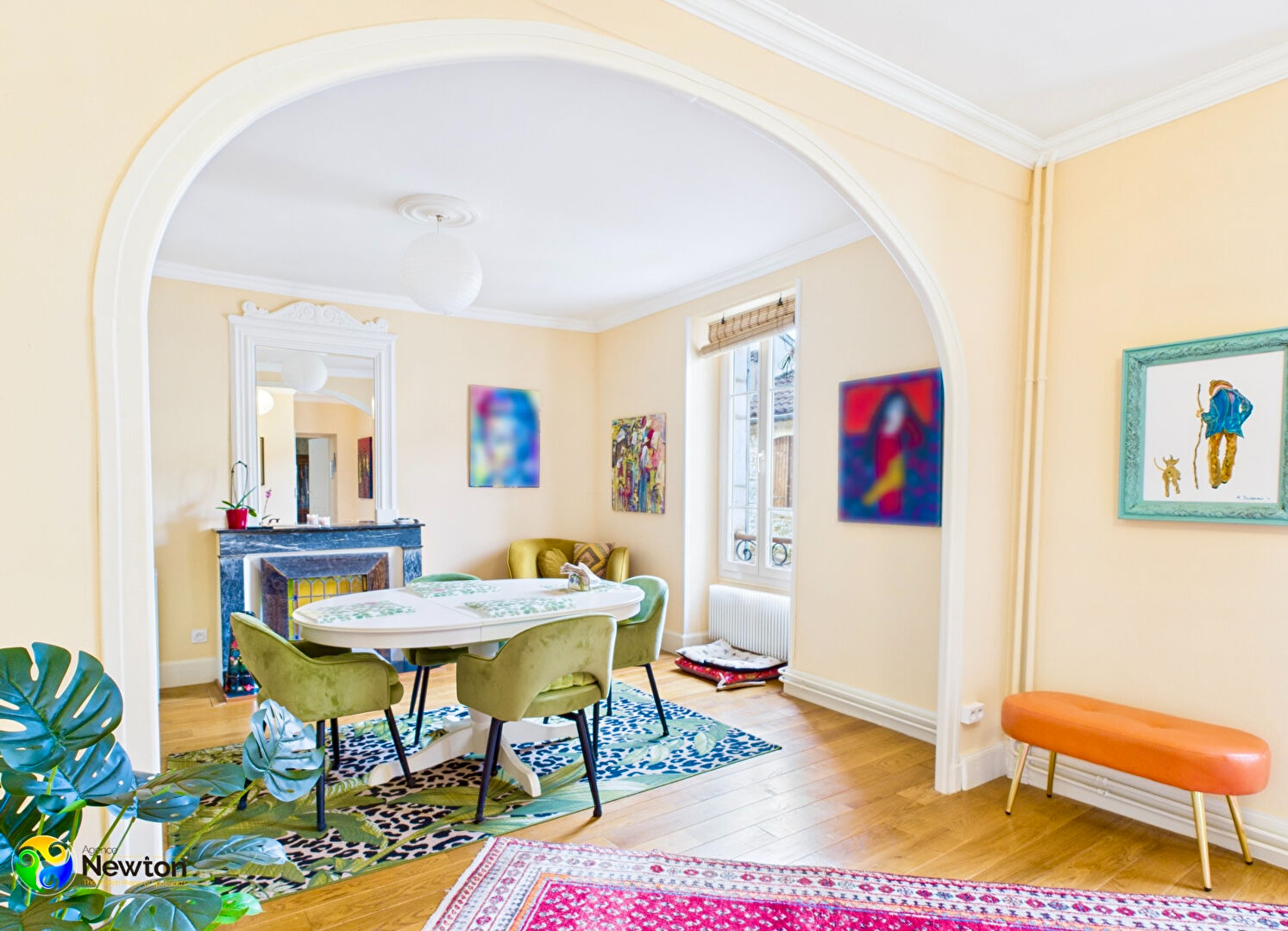 Spacious property in Lot, Occitanie, featuring a bright living area with elegant furnishings and decorative elements.