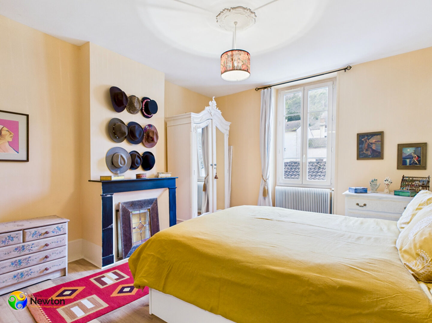 Modern property bathroom featuring a bath, shower, and double sink in Lot, Occitanie, 46220.
