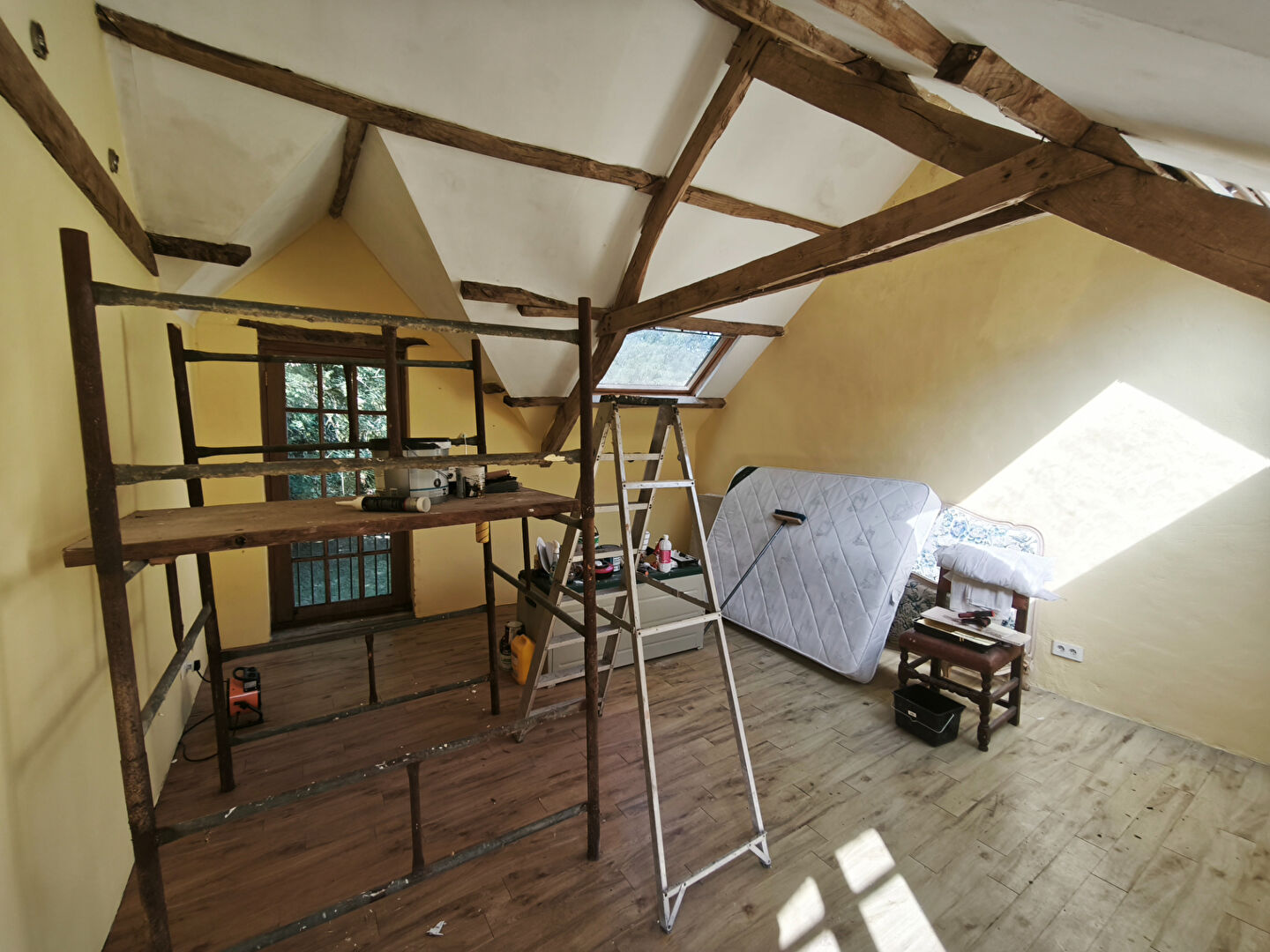 Three-bedroom property in Morbihan, Brittany, featuring exposed beams and renovation in progress.
