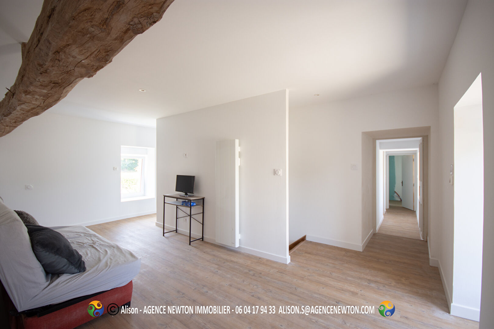Spacious interior of a property in Manche, Normandy, featuring modern design and natural light throughout.