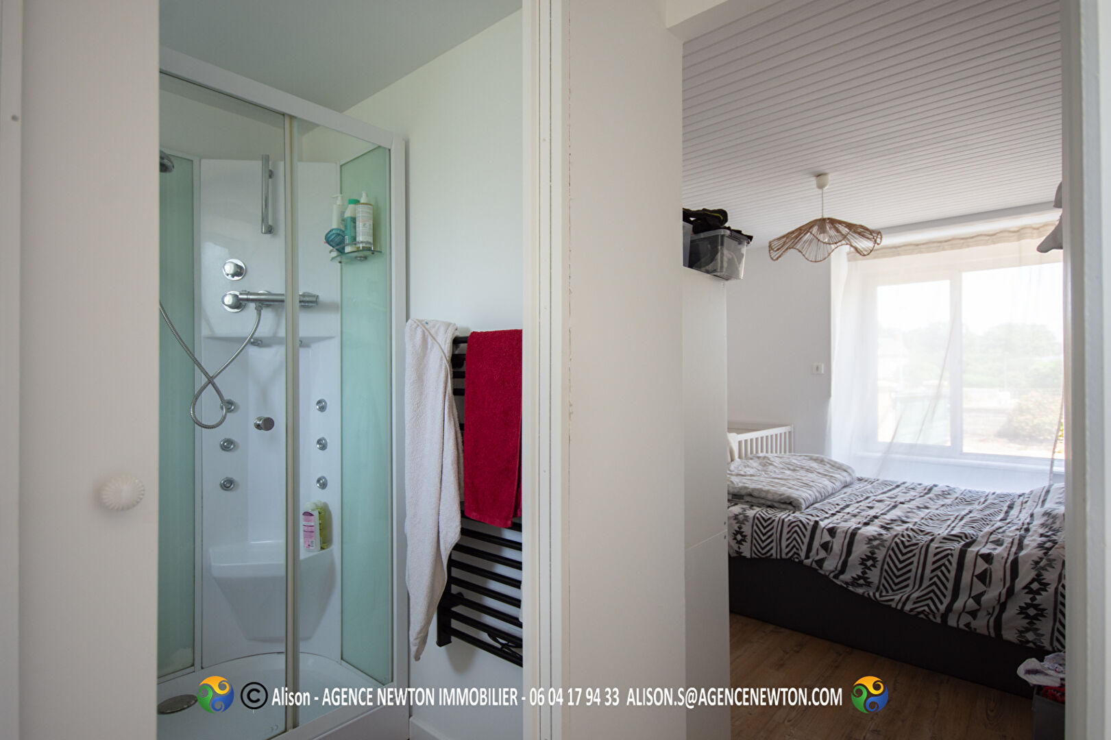 4-bedroom property in Manche, Normandy, featuring a modern shower and bright bedroom with natural light.