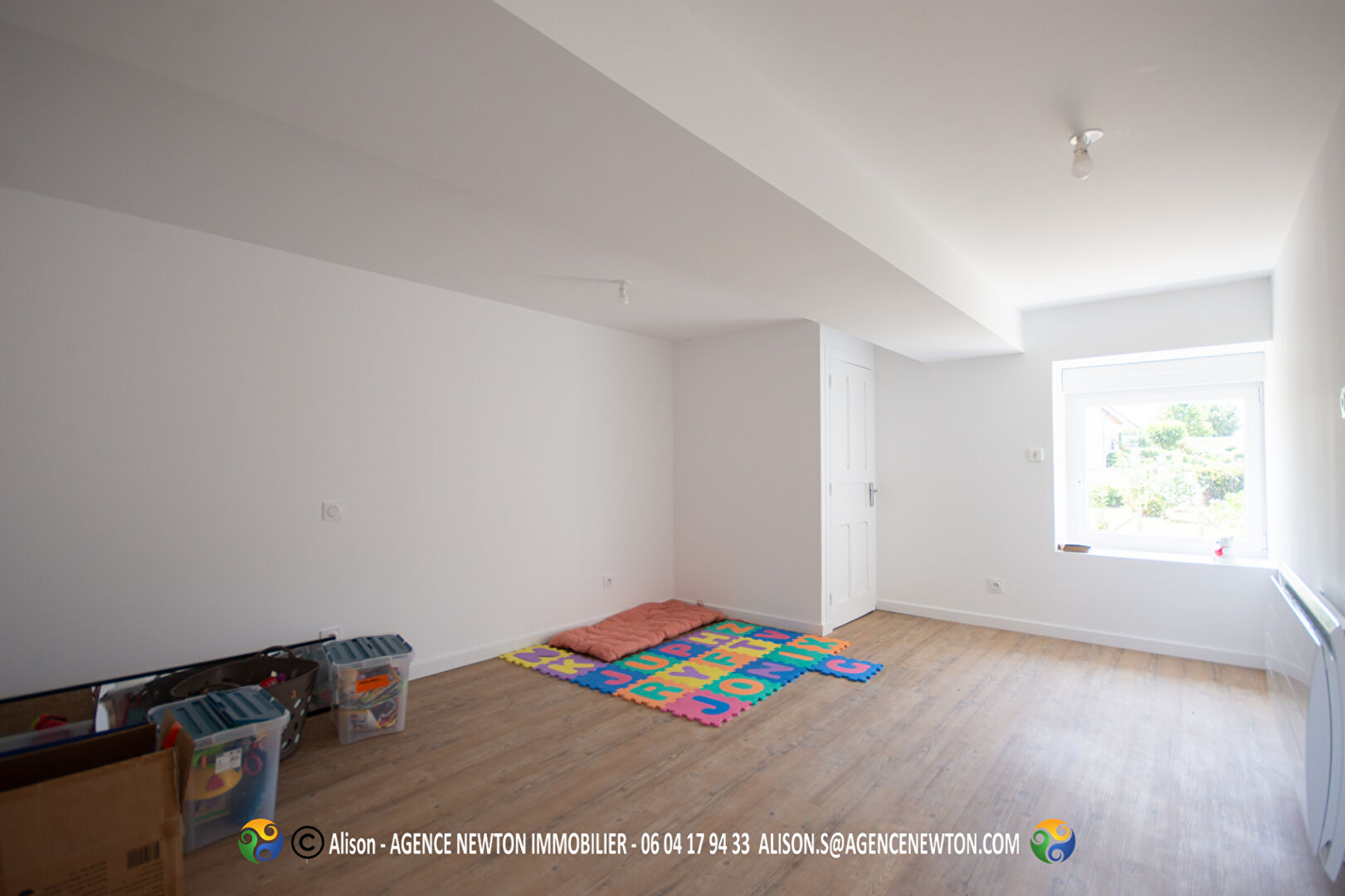 Spacious interior of a property in Manche, Normandy, featuring natural light and potential for personalised design.