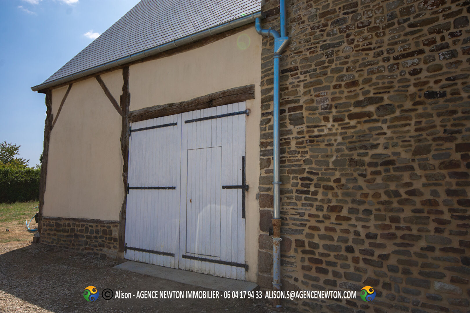 Four-bedroom property in Manche, Normandy, featuring a stone exterior and traditional architectural elements.