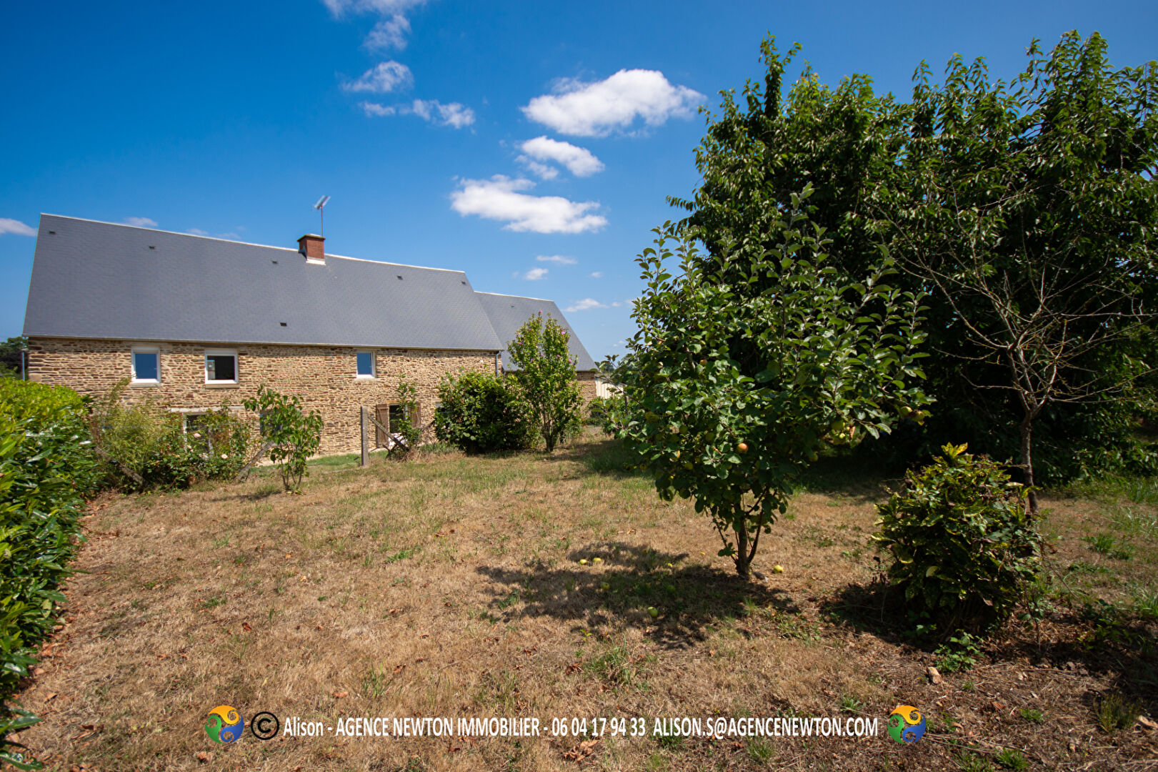 4-bedroom property in Manche, Normandy, featuring a spacious garden and modern architecture.