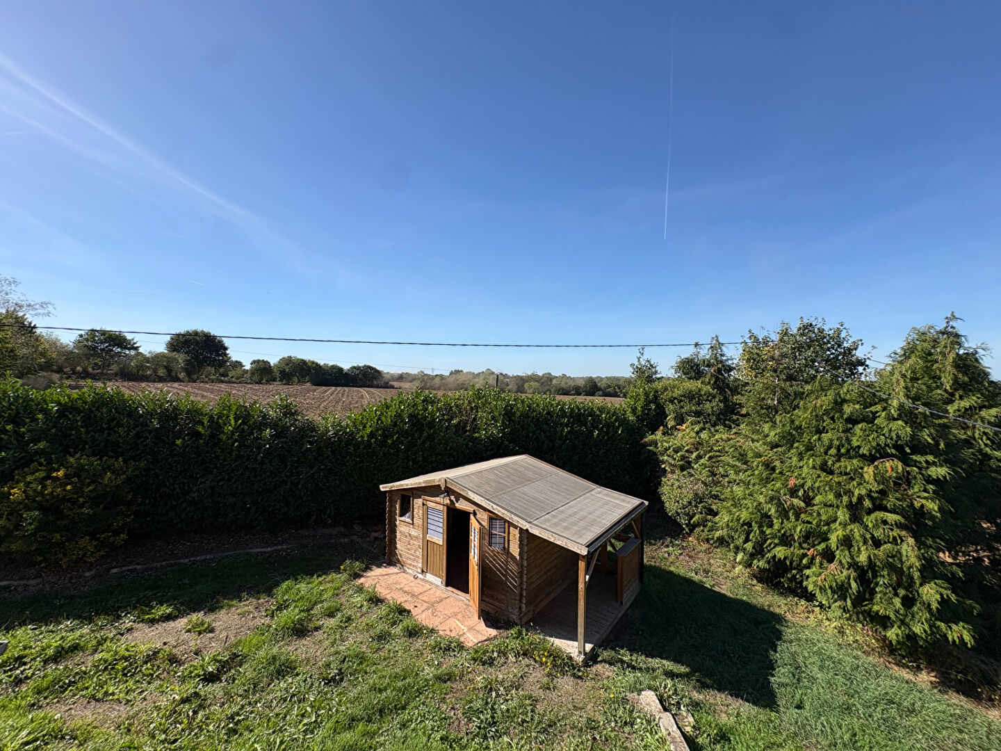 FINISTÈRE: Near Morlaix. Three bed house of 130 m² with workshop and 2,858 m² garden, 30 minutes from the coast.