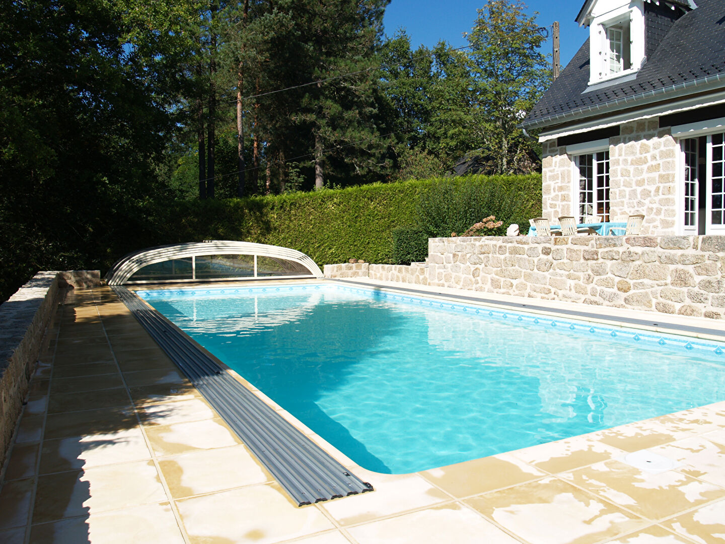 CORREZE. Sarran. Exquisite stone house with heated swimming pool. Parkland gardens of 5600m2.