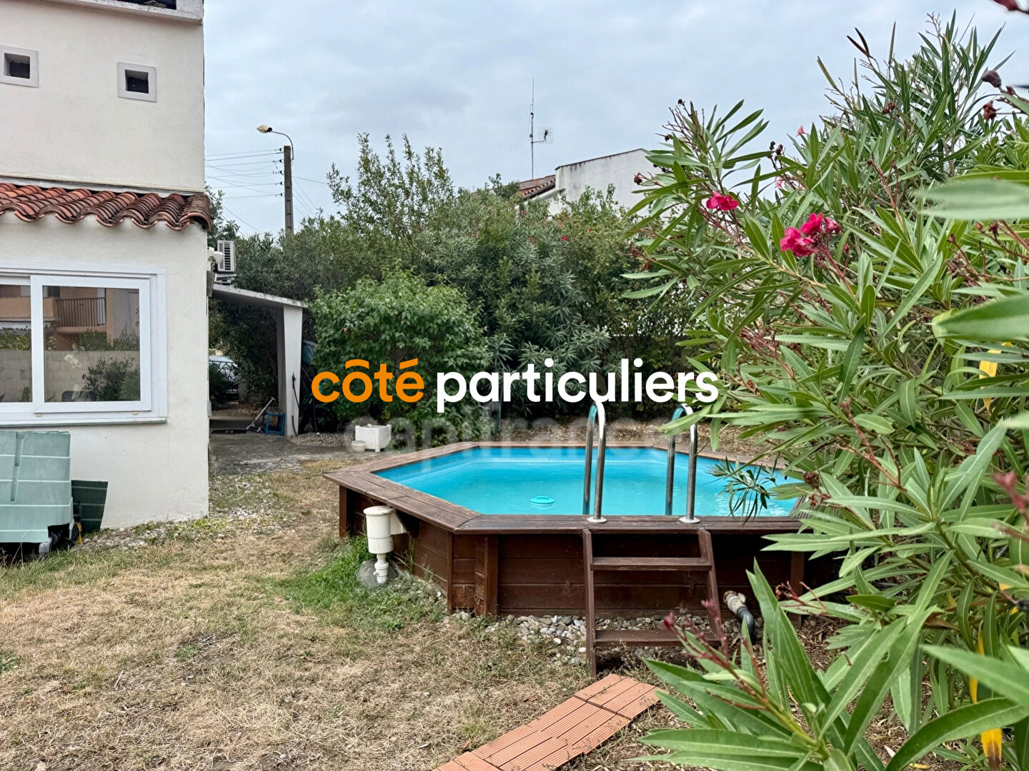 Photo Maison de102 m²  sur 356 m² de terrain clos et arboré (piscine hors sol) image 2/6