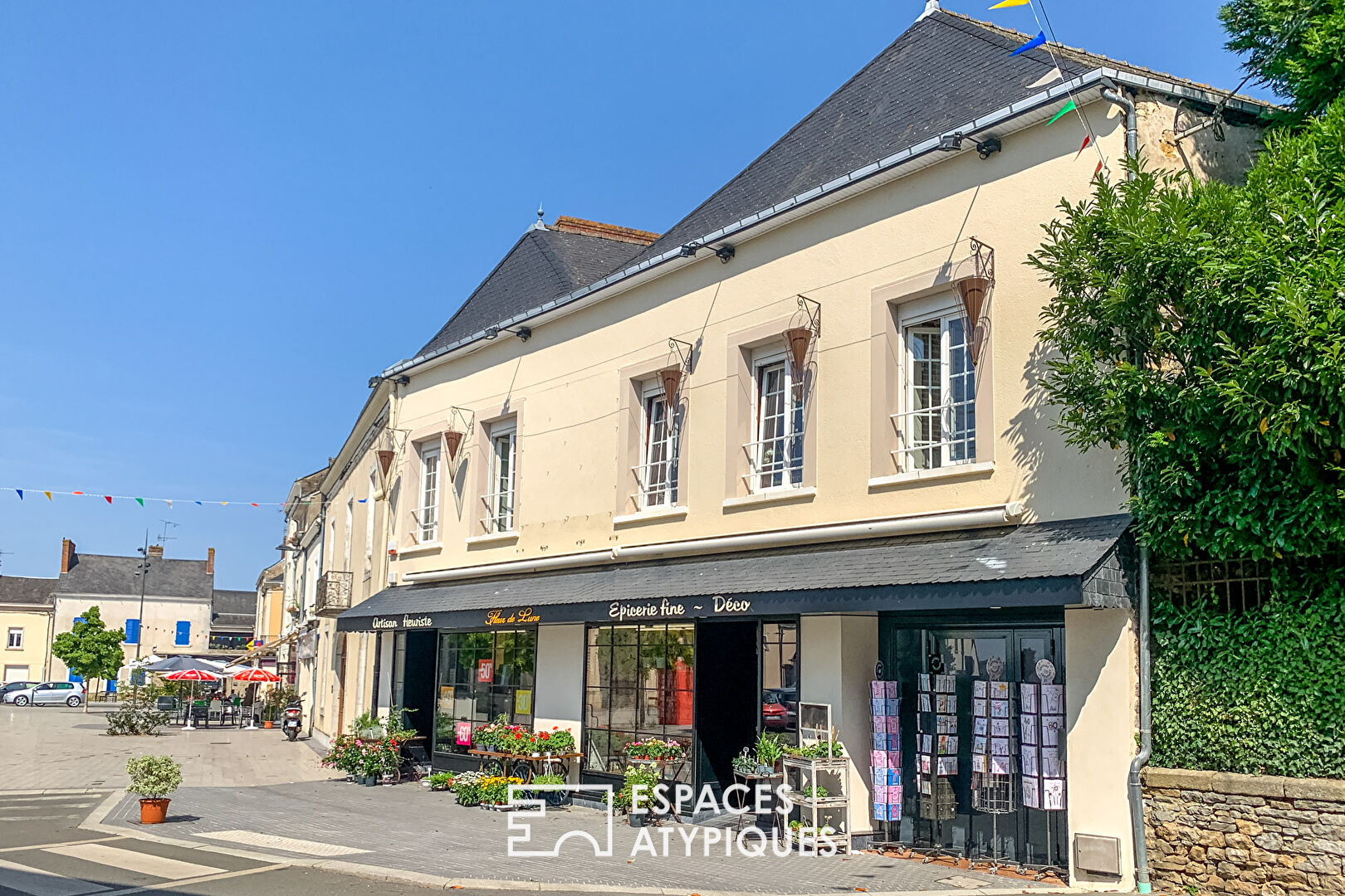 Photo Immeuble avec local commercial et grand appartement duplex image 2/6