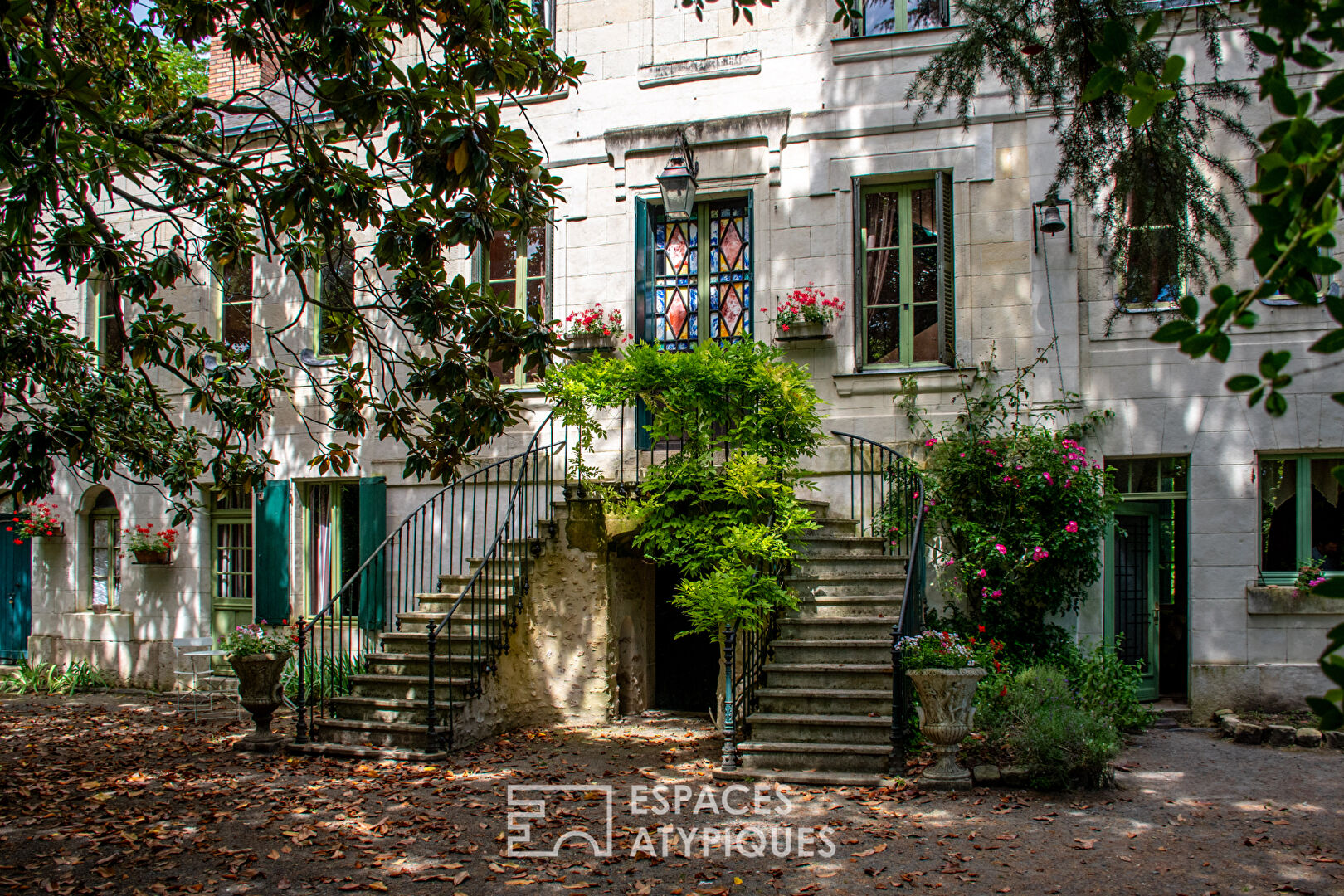 Maison de maître et son parc arboré en coeur de ville