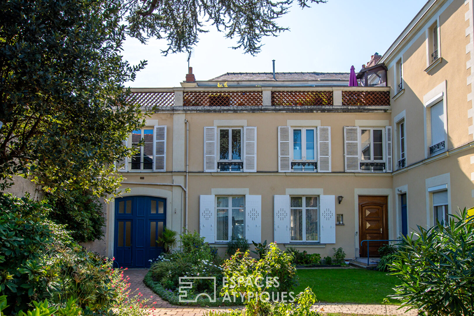 Somptueux duplex avec jardin et garage en centre-ville