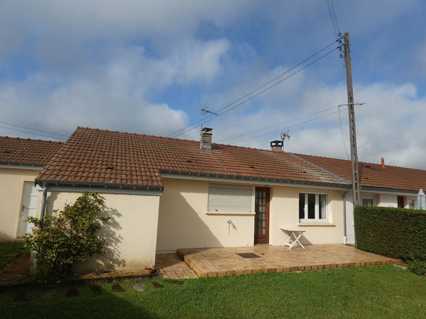 Photo Maison de plain pied avec garage et jardin image 2/6