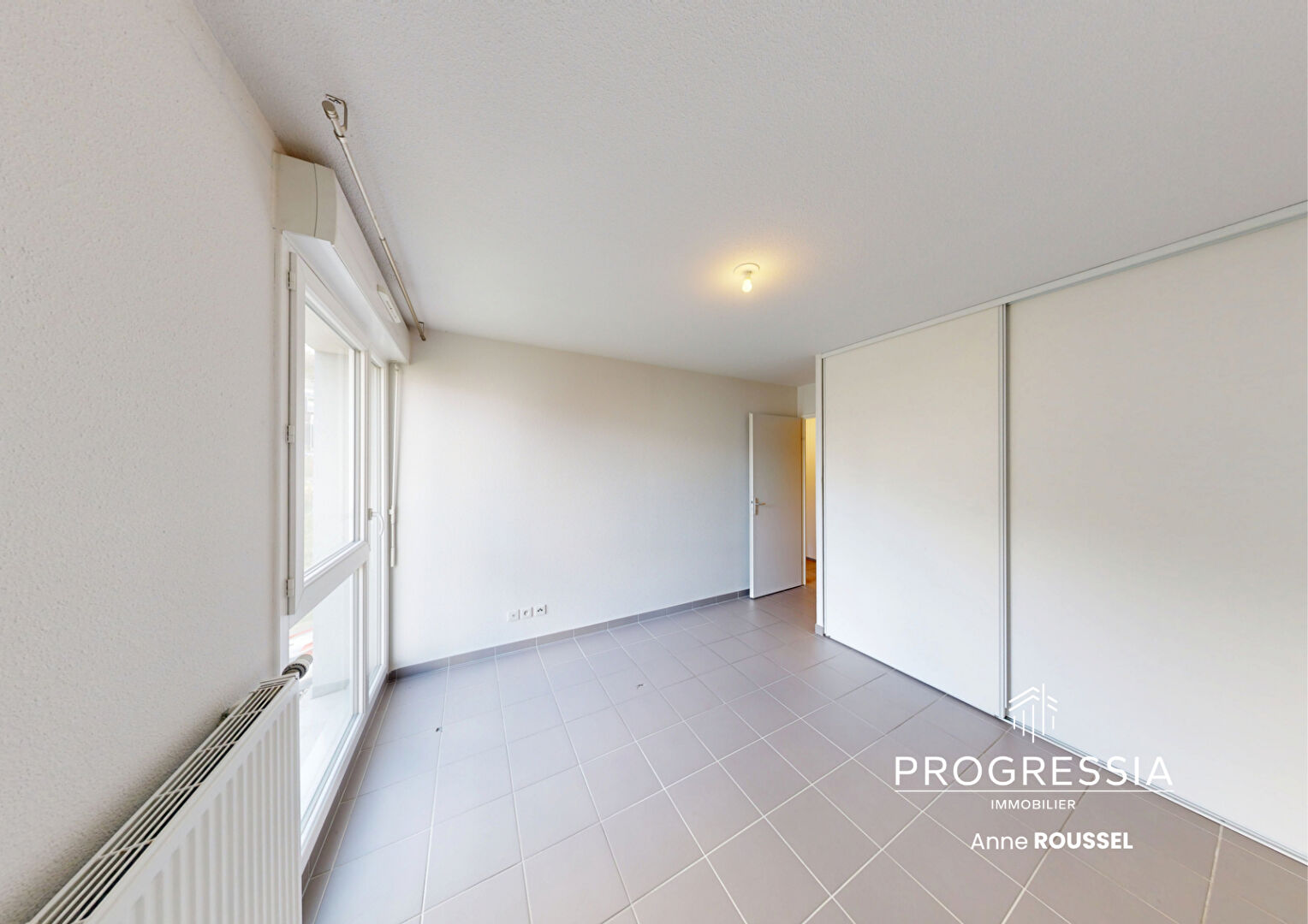 Progressia Immobilier - HARFLEUR / RESIDENCE RECENTE / ROSA PARKS / PLACE DE STATIONNEMENT