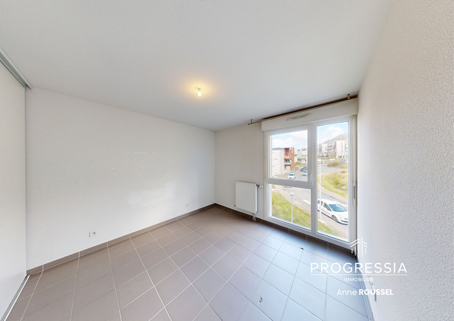 Progressia Immobilier - HARFLEUR / RESIDENCE RECENTE / ROSA PARKS / PLACE DE STATIONNEMENT