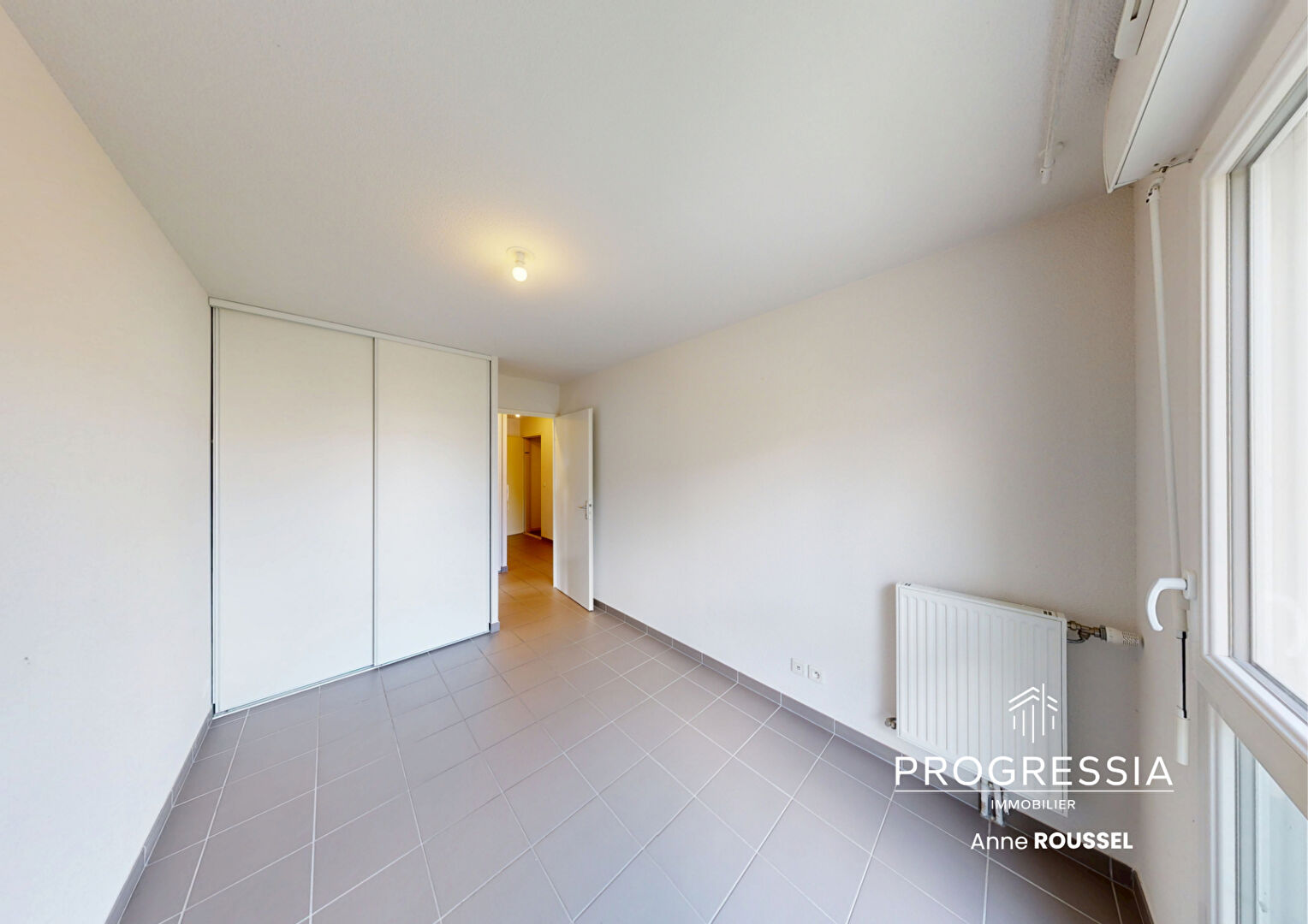 Progressia Immobilier - HARFLEUR / RESIDENCE RECENTE / ROSA PARKS / PLACE DE STATIONNEMENT