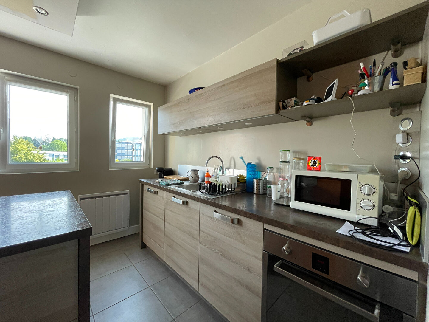 Appartement de type 4 avec balcons cave et garage