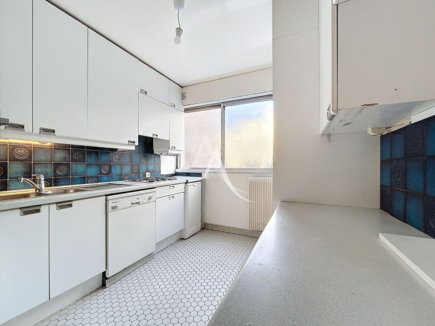 Photo Appartement familial traversant 4 pièces / 93,31 m², Place des Fêtes image 2/5