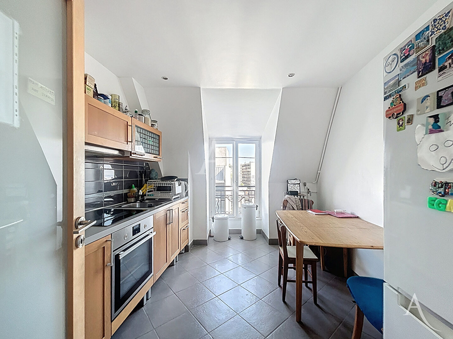 Photo Paris 20ème - Dernier étage avec vue dégagée ! image 2/5