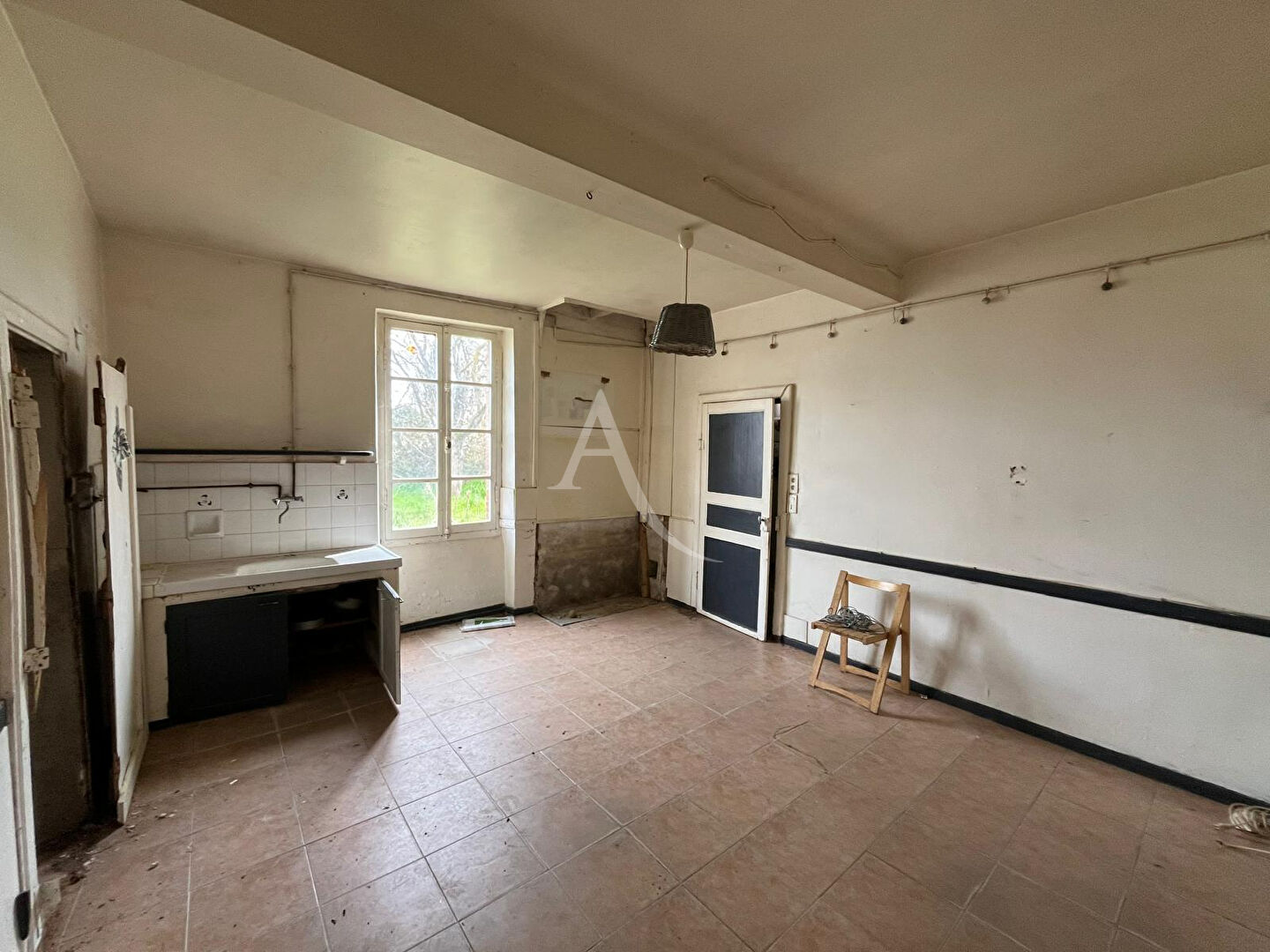 Photo Ancienne bâtisse avec jardin située au centre de Bessières ! image 4/6